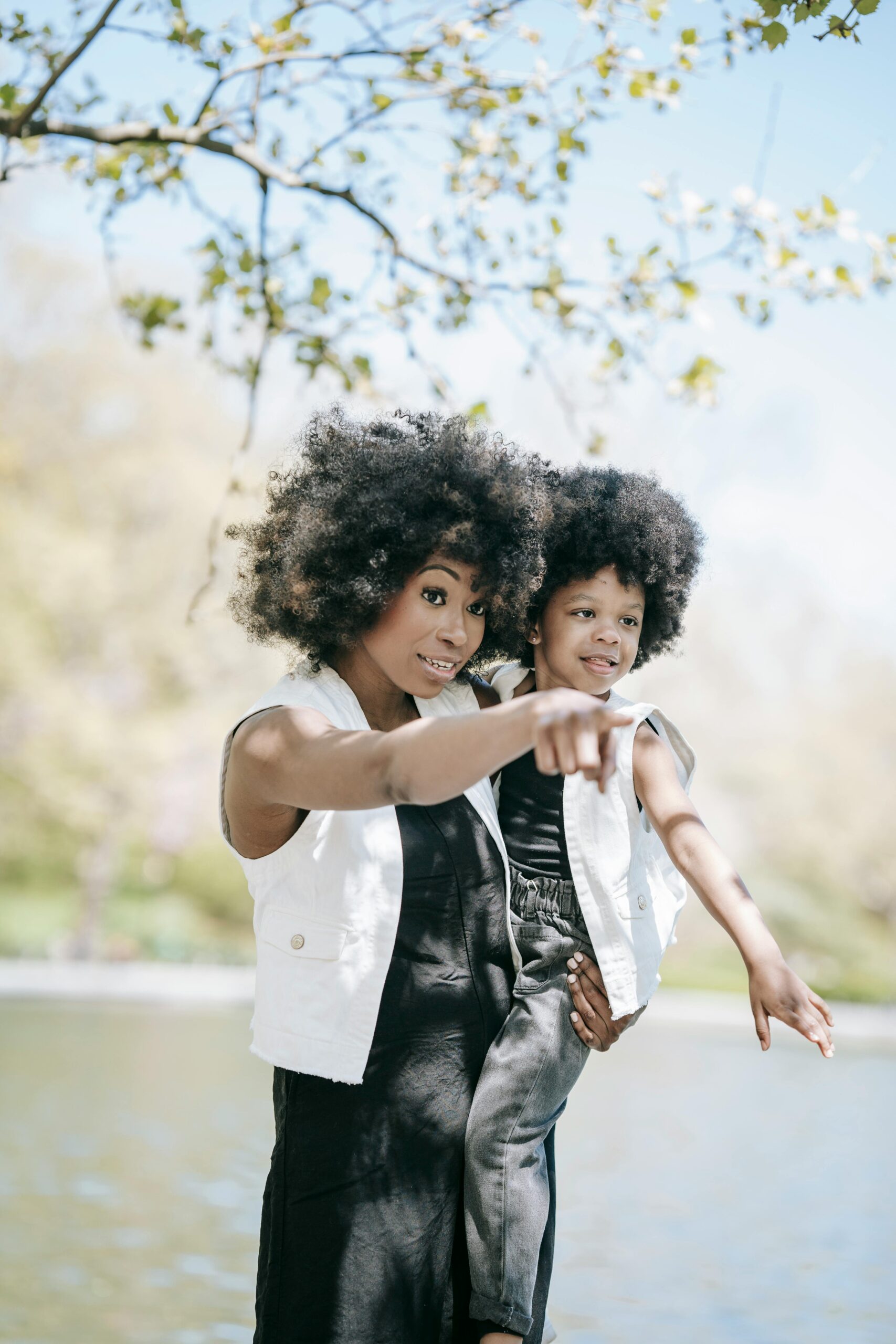 A joyful mother and son bonding outdoors, capturing a precious moment in nature.